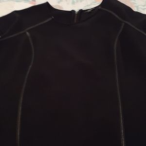 Simple black dress with zipper down back